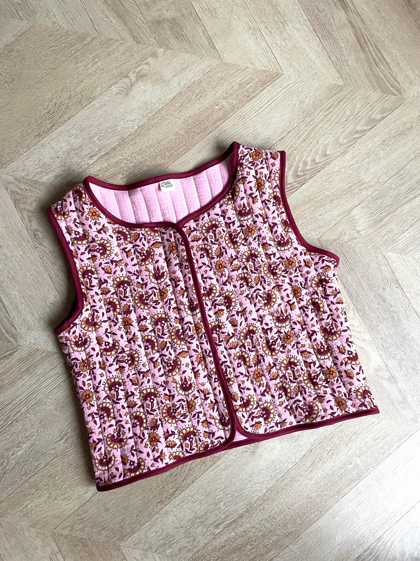 Gilet sans manche fleuri rose